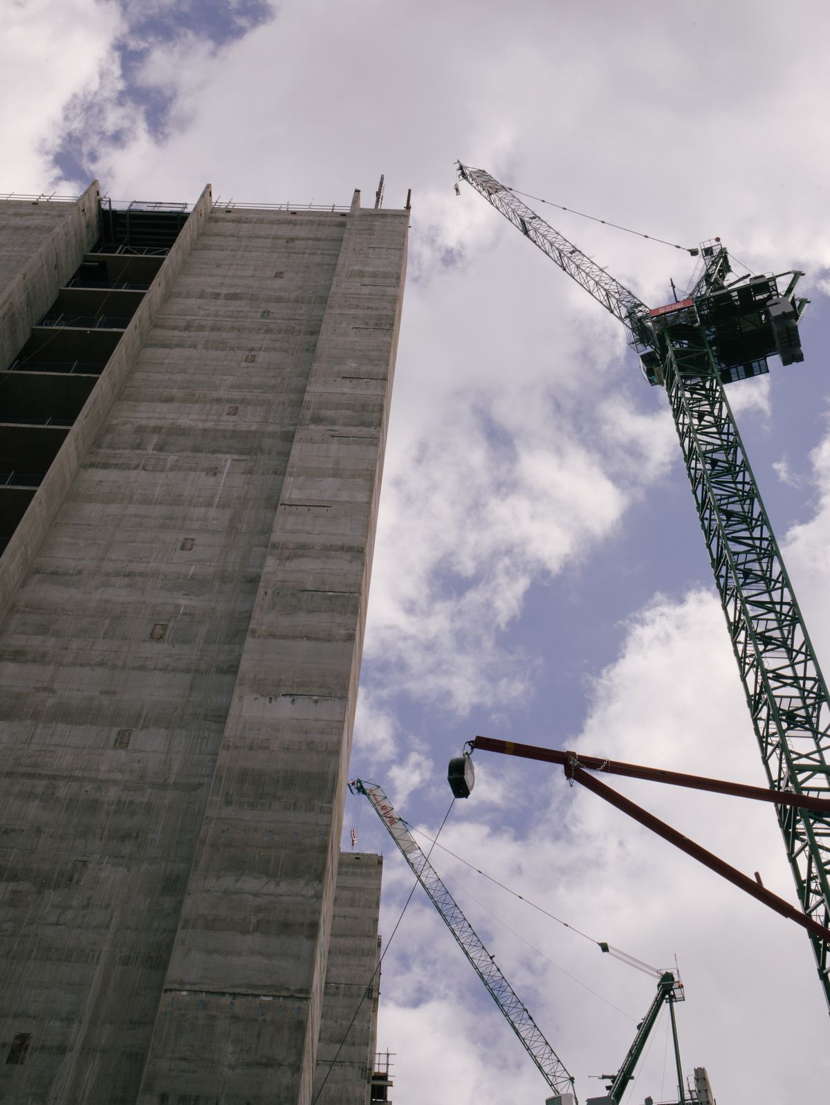 Infrastructure investment in Vietnam: construction site with tower crane