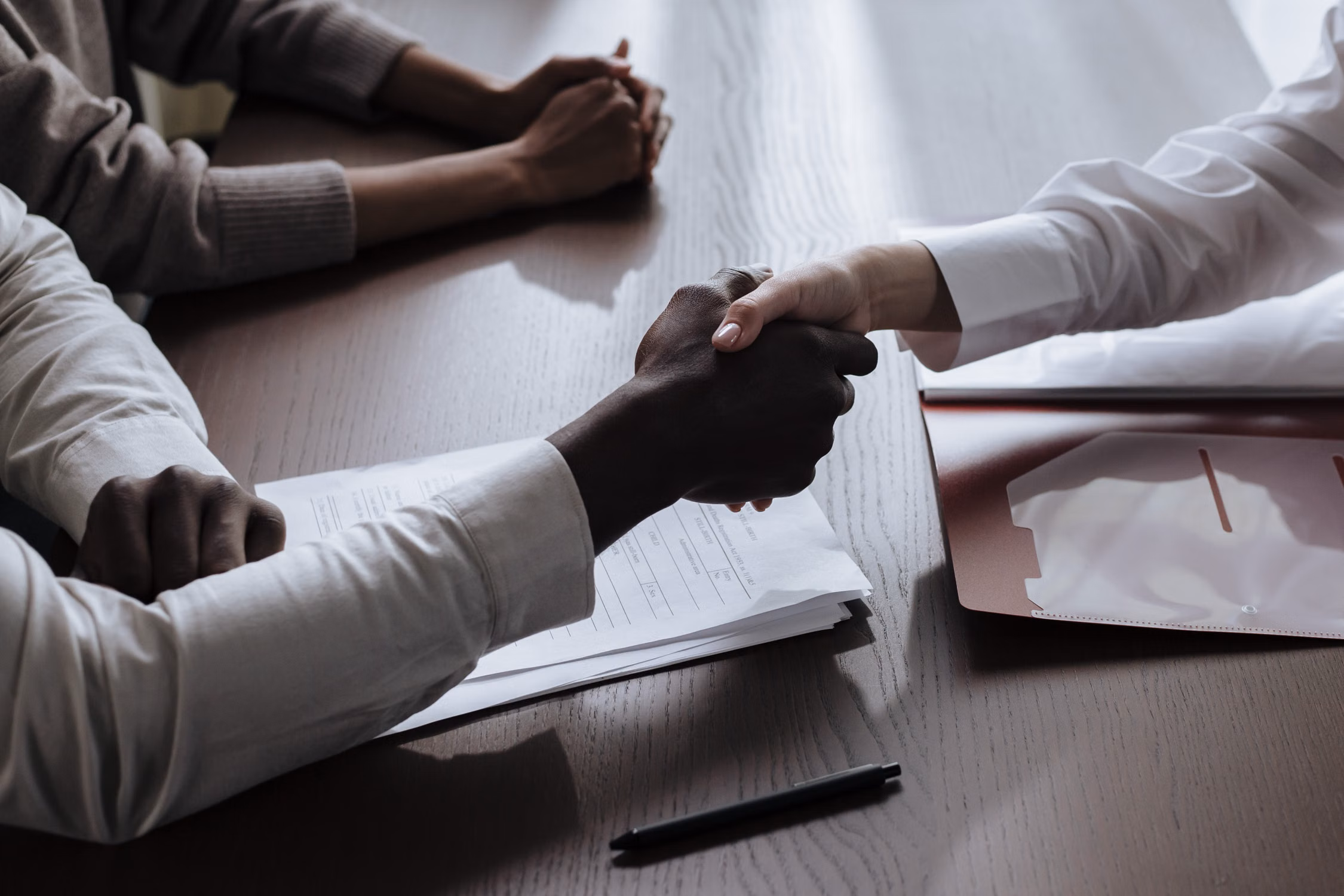 Handshake after agreeing an M&A letter of intent