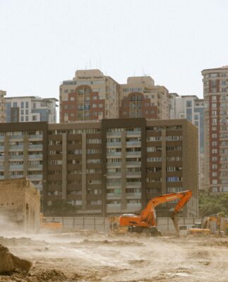 Real estate M&A lawyers reviewing a Vietnamese development project site