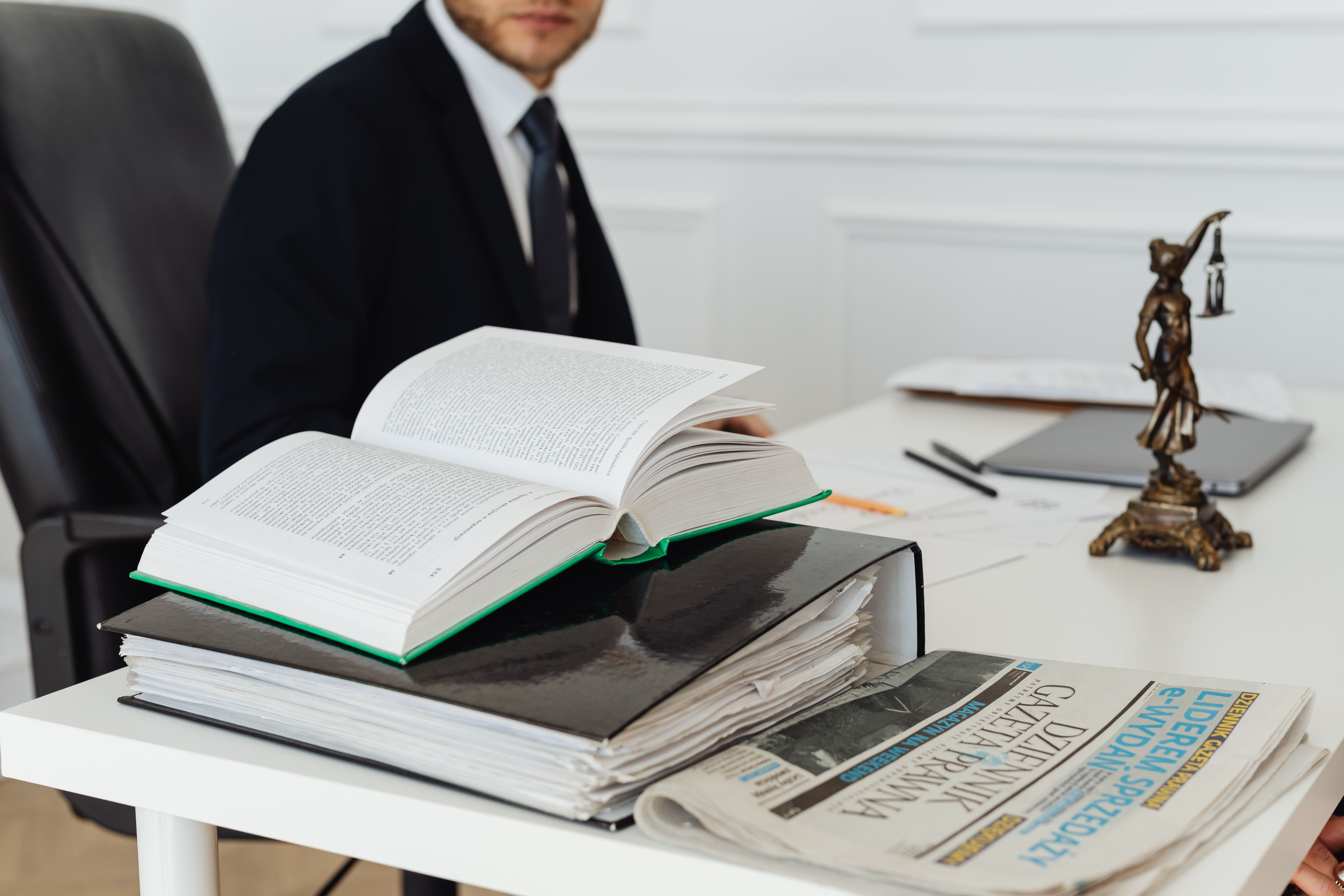 Book and binder for reviewing acquisition legal risks