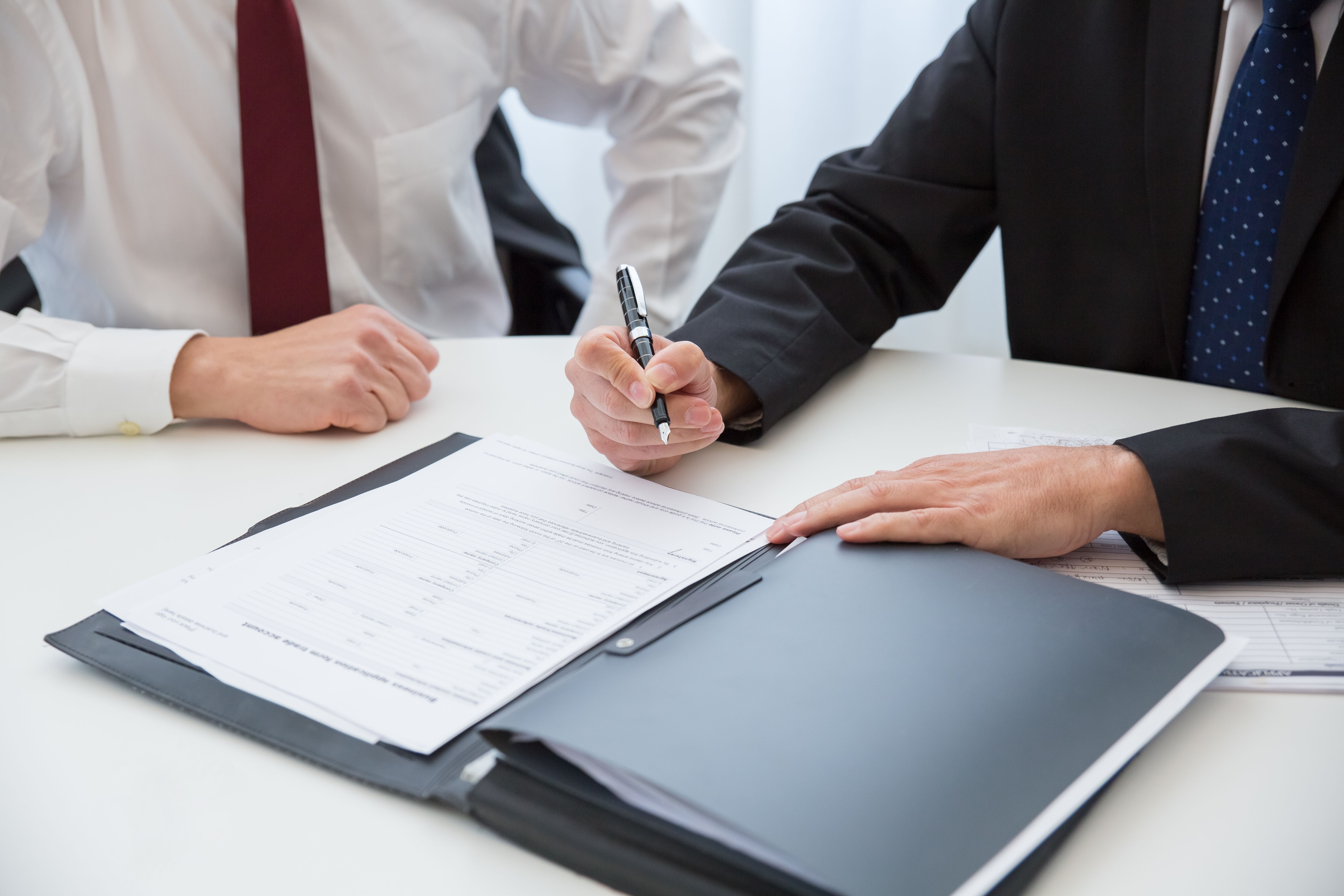 lawyer drafting M&A indemnification provisions
