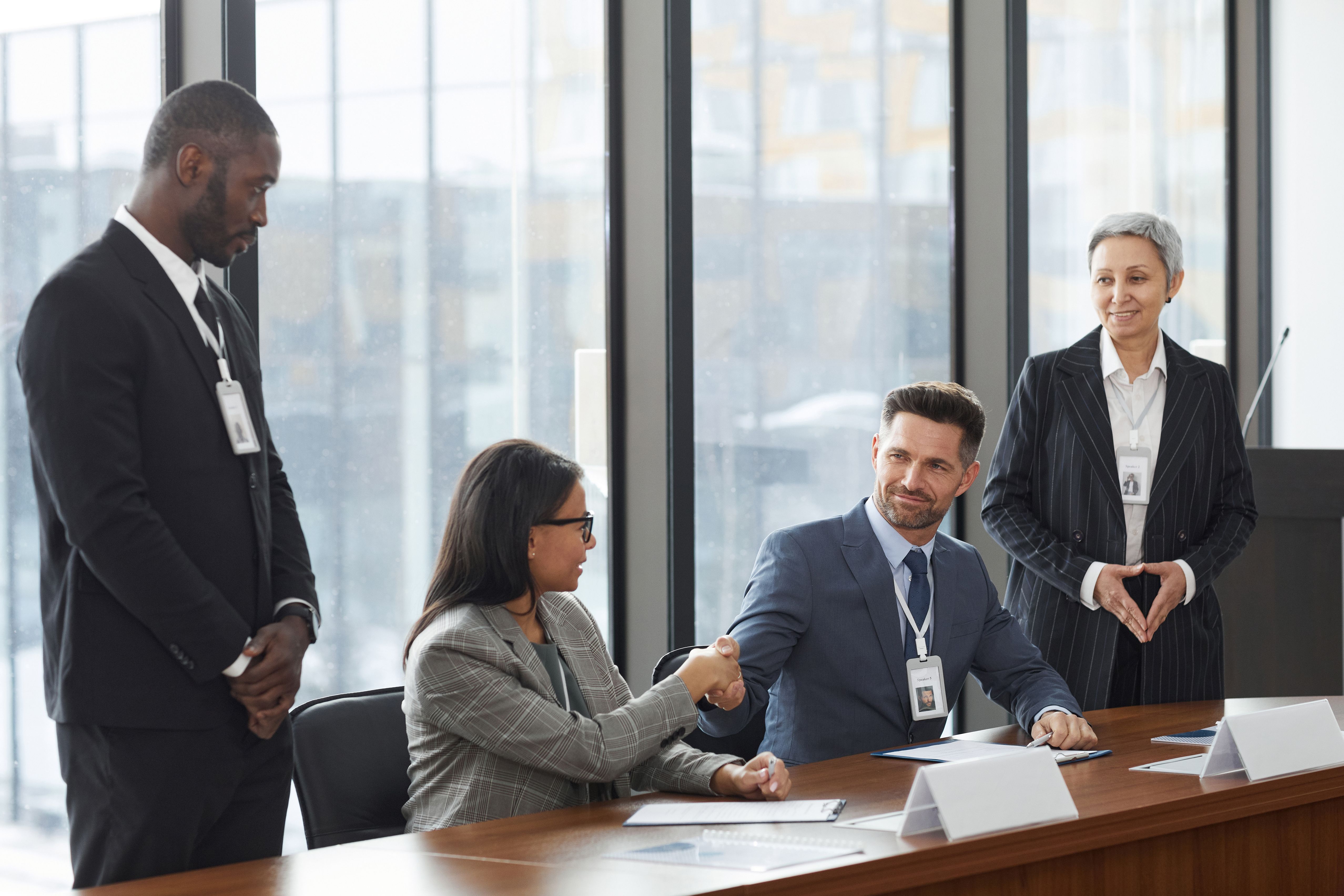 M&A non-compete negotiation and handshake
