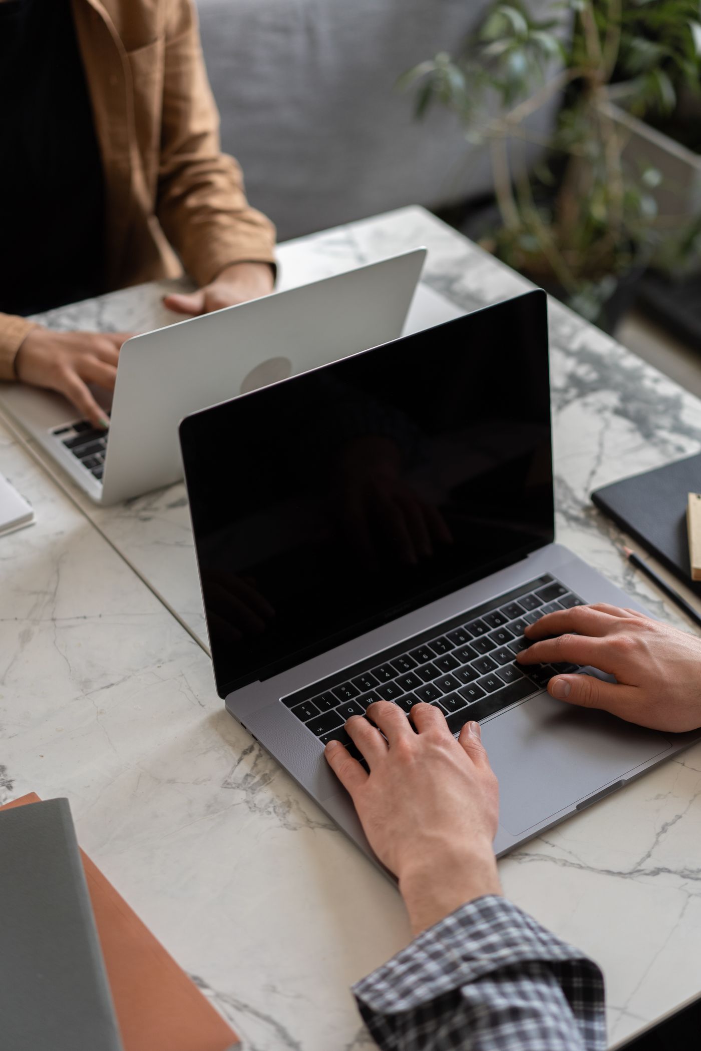 Buyer legal team reviewing data privacy compliance Vietnam M&A contract on laptop